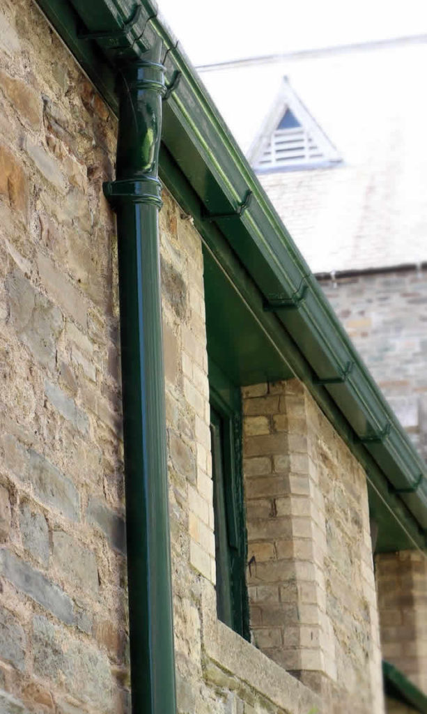 Exterior painting service on a traditional property